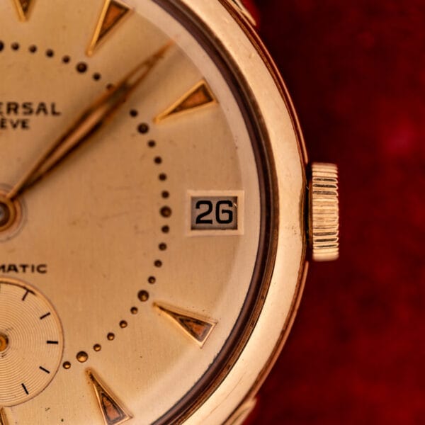 Universal Geneve Roulette Date dial showing red and black numerals at 3 o'clock