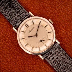 Vintage LeCoultre Ref. 3022 dress watch on caramel leather, honey-aged factory silver dial signed LeCoultre with sub-seconds at six