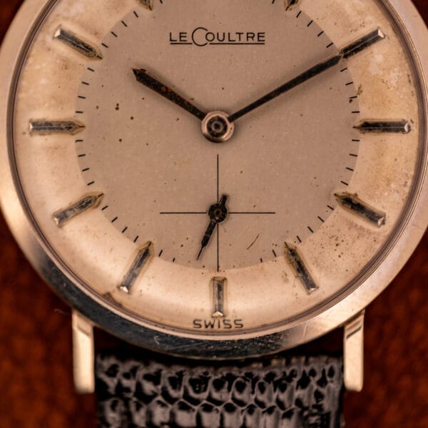 LeCoultre 3022 dial macro showing LeCoultre signature, applied faceted baton markers and SWISS designation at six