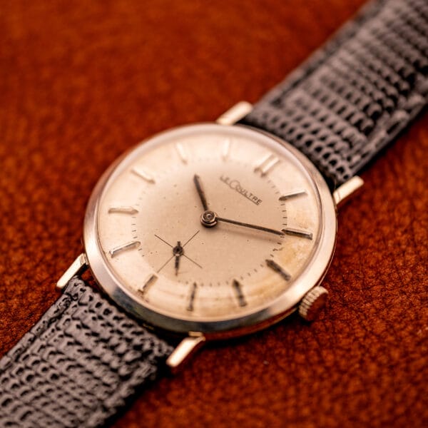 LeCoultre 3022 top-down on caramel leather, full honey-aged silver dial and dauphine hands visible