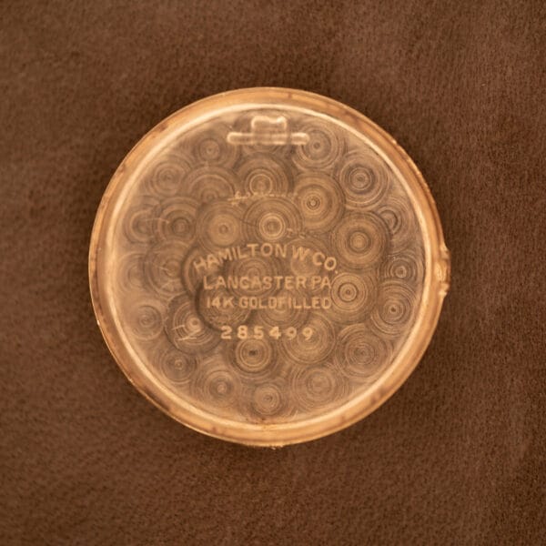 Hamilton W. Co. Lancaster PA 14k goldfilled outer caseback with guilloche spotted-circle pattern