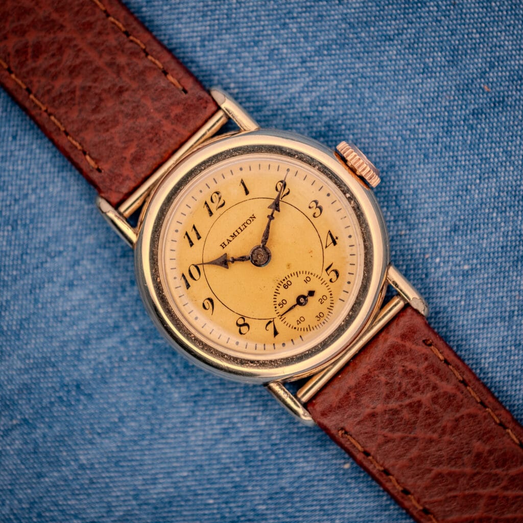1936 Hamilton Randolph 10k gold filled Art Deco wristwatch with cream dial and blued cathedral hands on textured brown leather strap
