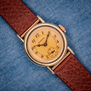 1936 Hamilton Randolph 10k gold filled Art Deco wristwatch with cream dial and blued cathedral hands on textured brown leather strap