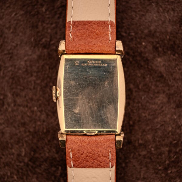 Gruen Veri-Thin Precision outer caseback stamped GRUEN 10K GOLDFILLED with crown-shield logo