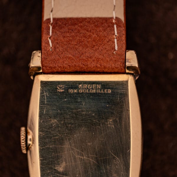 Gruen 10K GOLDFILLED caseback stamping close-up with Gruen crown-shield mark