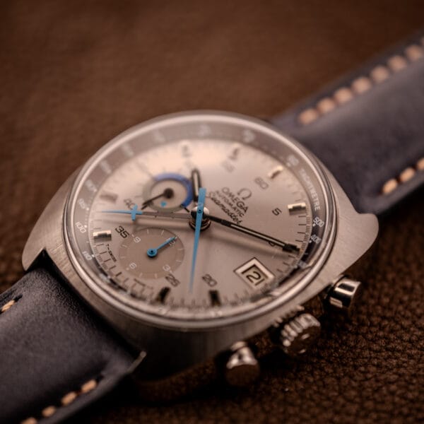 Omega Seamaster 176.007 Blue Jedi three-quarter view on navy blue leather strap with cushion stainless steel case