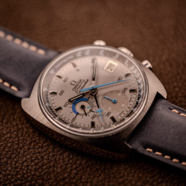Omega 176.007 Blue Jedi angled wrist-style shot showing silver sunburst dial and sky-blue chronograph accents