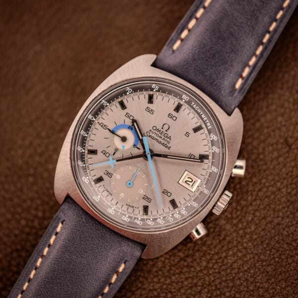 Omega Seamaster 176.007 full dial view with applied black baton markers, aged cream tritium plots and 38.3mm cushion case