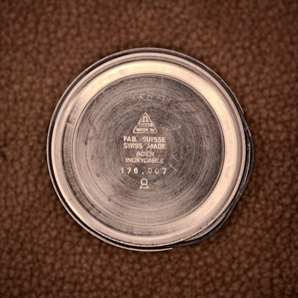Omega 176.007 inner caseback stamped FAB. SUISSE / SWISS MADE / ACIER INOXYDABLE / 176.007 with Omega Watch Co. triangle