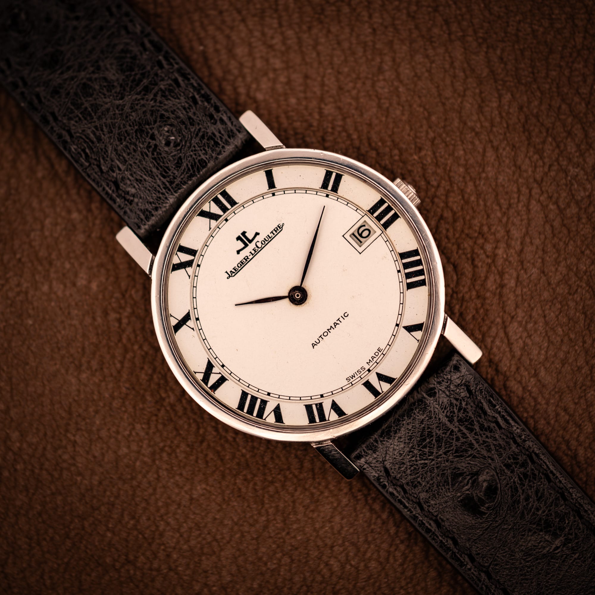 DSCF2904 Jaeger LeCoultre Ultra Thin Ref. 5003.42 steel automatic, factory white Roman numeral dial, black ostrich strap, top-down hero shot.