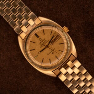 Omega Constellation 168.029 day-date with gold linen dial and applied baton markers on integrated gold bracelet
