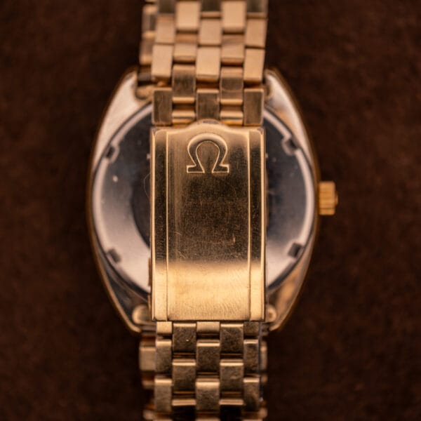 Omega Constellation 168.029 signed gold folding clasp with Omega logo on integrated gold-filled bracelet
