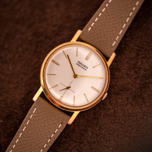 Gruen Precision 510 cream dial top-down low-angle view with GRUEN PRECISION text and sub-seconds register