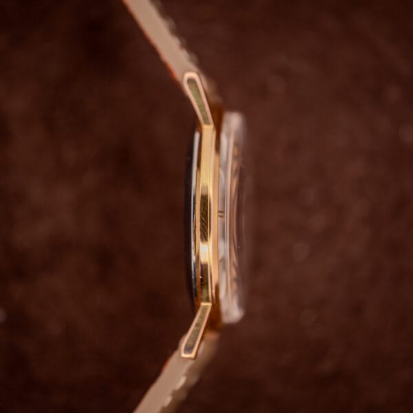 Gruen Precision 510 opposite side profile showing slim case midband, flat lugs, and acrylic crystal doming