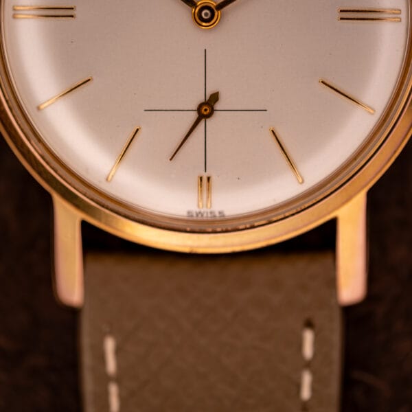 Gruen Precision 510 lower dial close-up with sub-seconds crosshair register and SWISS printing at six