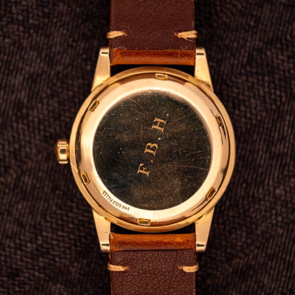 Omega Seamaster GX 6250 caseback exterior with period F.B.H. owner monogram and 14k GOLD FILLED stamp