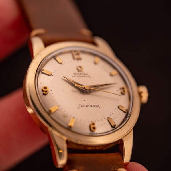 Omega Seamaster GX 6250 dial close-up showing factory silver surface, dauphine hands, and cursive Seamaster script