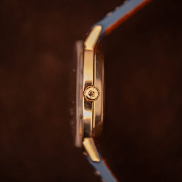 Hamilton Masterpiece Cal. 836 dial and signed crown shown from above-right with date aperture at three