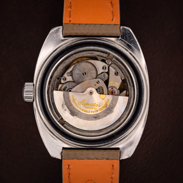 Aquastar Atoll 1001 A. Schild caliber 1903 automatic movement with signed yellow Aquastar rotor visible through caseback