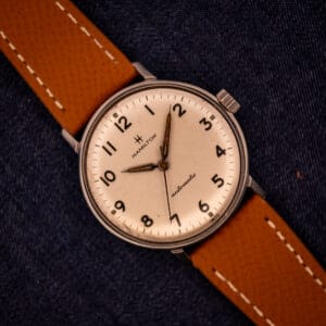 Vintage Hamilton Accumatic A-507 with white textured Arabic numeral dial on tan saffiano leather strap