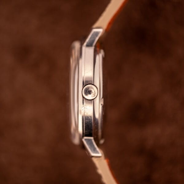 Gruen Precision 34.5mm stainless steel case side profile showing slim case band and faceted lug tops