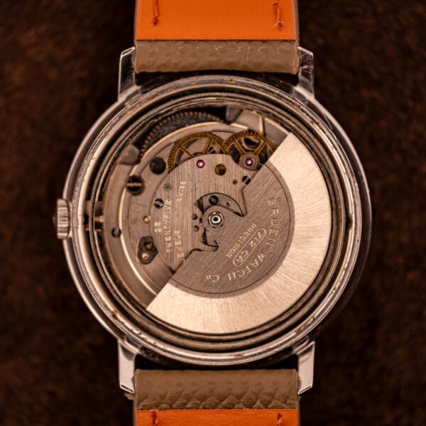 Gruen caliber 712 CA full-rotor 25-jewel automatic movement view showing nickel bridges and balance wheel
