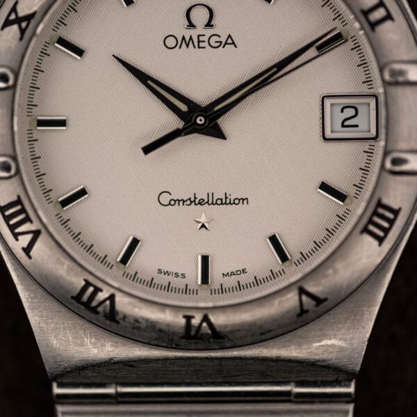 Omega Constellation 1512.30 lower dial close-up with Constellation script, Constellation star, and SWISS MADE printed at six