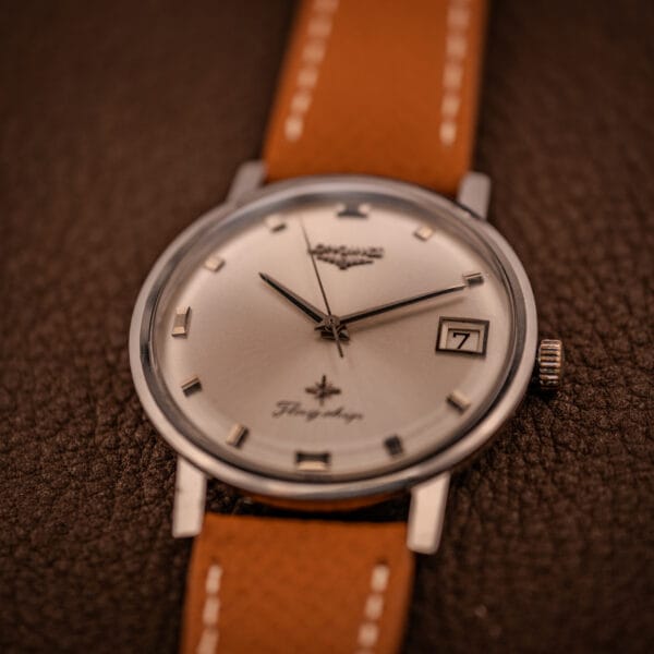 Vintage Longines Flagship 2821-285 dial-up presentation on tan saffiano leather strap with white contrast stitching
