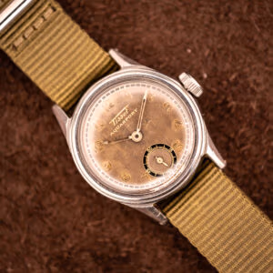 Vintage Tissot Aquasport reference Cal. 27 with tropical bronze dial, gilt Arabic numerals, on olive green canvas military strap