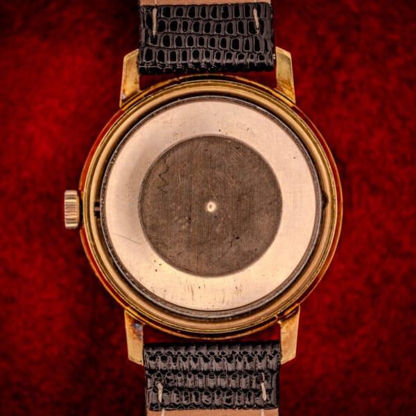 Vintage Gruen Precision case interior detail showing dust cover ring above the caliber 712 CA movement seat