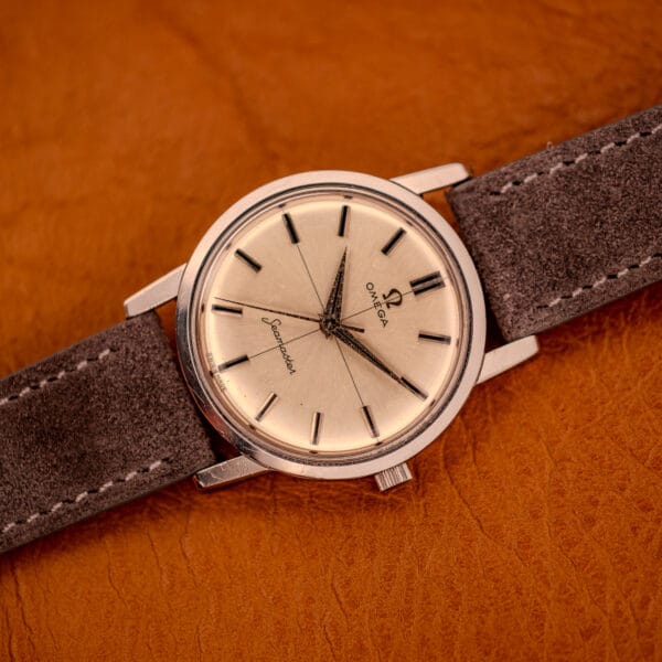 Omega Seamaster 135.005 dial reading from above with applied baton markers and intact cross-hair pattern fully visible