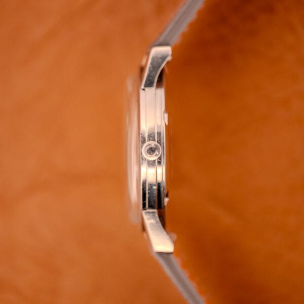 Omega Seamaster 135.005 case side profile showing original signed crown with clearly stamped Omega logo on its face