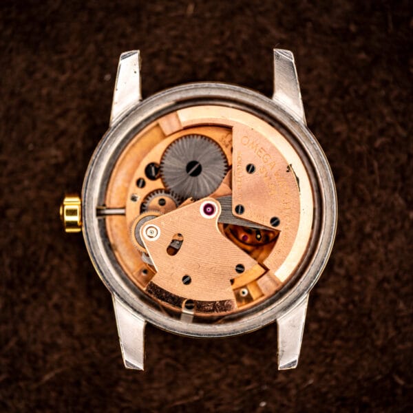 Omega caliber 354 bumper automatic movement, copper-toned bridges signed OMEGA WATCH CO