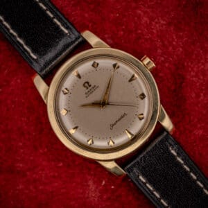 Omega Seamaster bumper ref. 2577-22 gold-capped case with cream two-tier dial, applied dart markers and gold dauphine hands on black leather strap