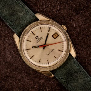 Omega Seamaster 166.028 gold-capped automatic, champagne dial with orange center seconds hand, on forest green suede strap
