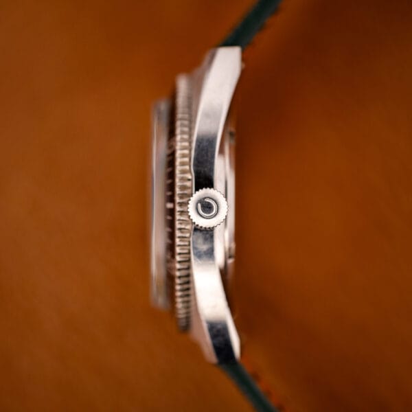 Caravelle Devil Diver signed C crown and polished case flank in side profile