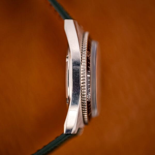 Caravelle 3286-DP stainless case side profile with coin-edge dive bezel and domed acrylic crystal
