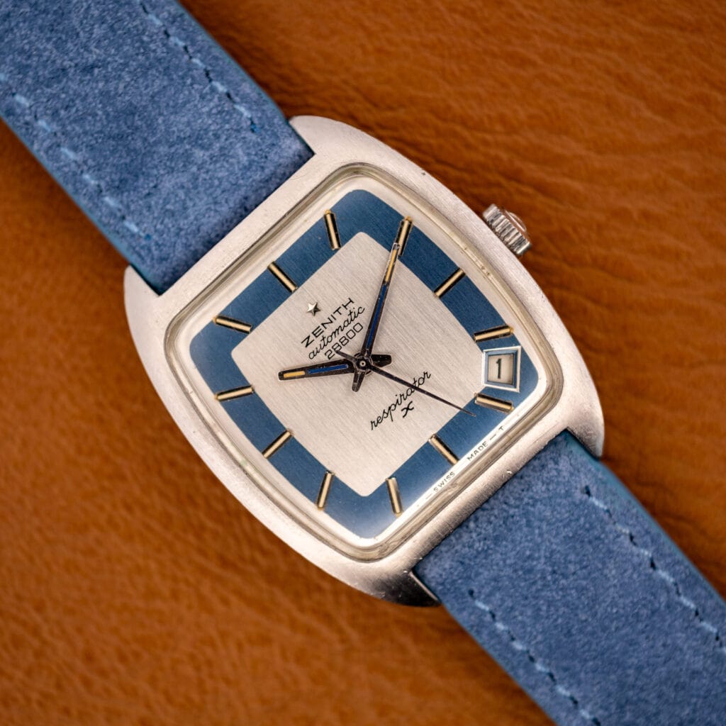 Zenith Respirator X stainless tonneau watch, layered silver and powder-blue dial with diamond date window, on blue suede strap