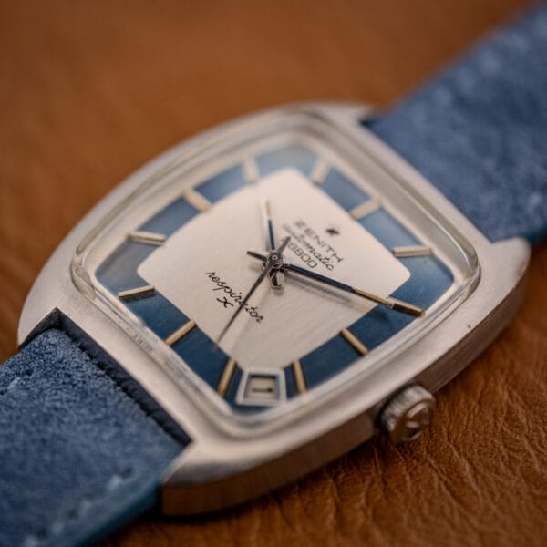Zenith Respirator X dial and case three-quarter macro with gold baton markers and the diamond date window