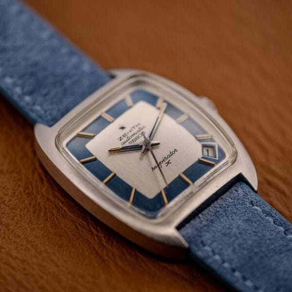 Zenith Respirator X top-down view, brushed tonneau case with powder-blue suede strap and OTTUHR signed buckle