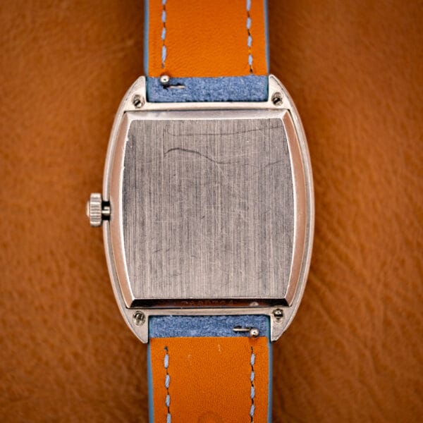 Zenith Respirator X brushed stainless steel snap caseback with case-number stamping and honest surface wear