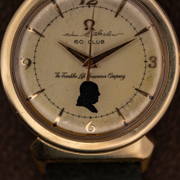 Omega Seamaster 14363 eggshell dial with applied gold Arabic 3, 6, 9 numerals and faceted baton markers