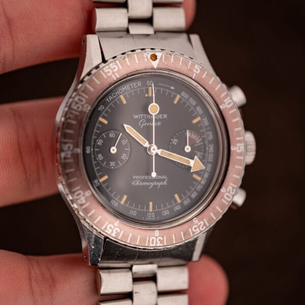 Wittnauer Geneve Professional Chronograph dial in hand with T SWISS T tritium markings and aged cream lume on arrow hands