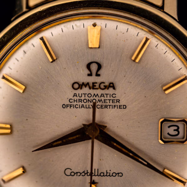 Omega Constellation 168.004 dial close-up showing the applied Omega logo and AUTOMATIC CHRONOMETER OFFICIALLY CERTIFIED printing