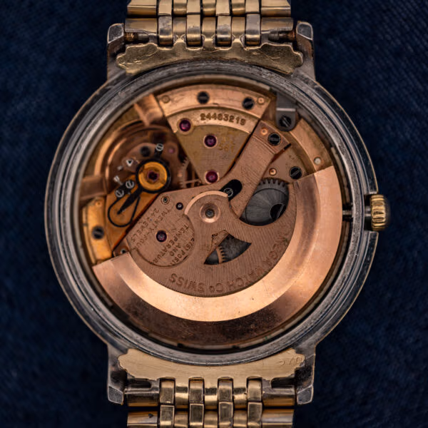 Omega caliber 561 automatic movement, copper finish, signed OMEGA WATCH CO SWISS, serial 24463219