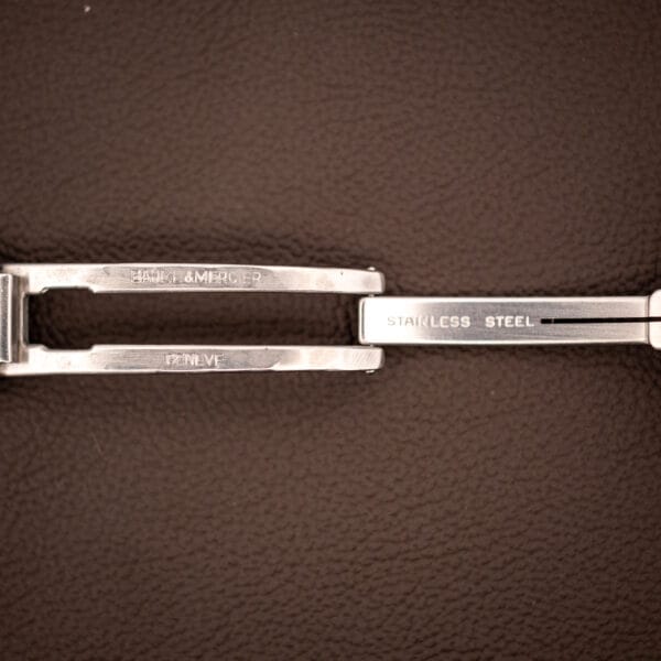 Baume & Mercier Riviera signed folding clasp stamped BAUME & MERCIER GENEVE and STAINLESS STEEL, shown open