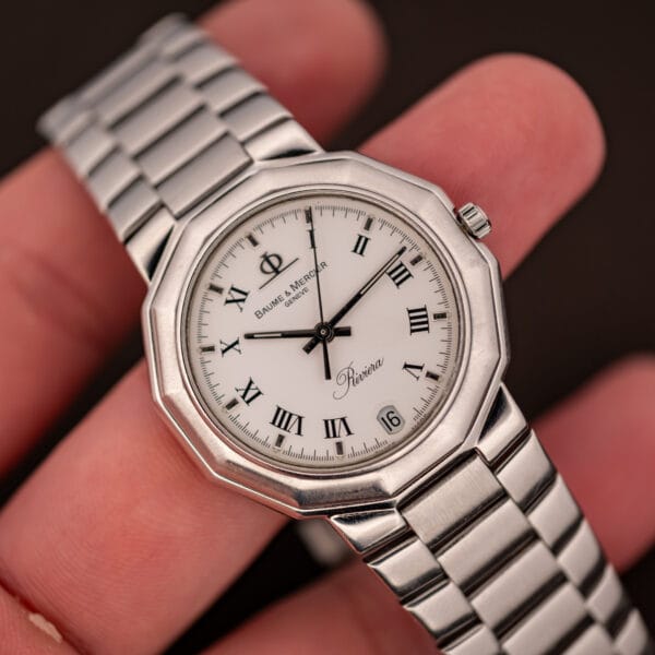 Baume & Mercier Riviera 5131.2 in hand, white dial with applied markers, Roman numerals and date at six