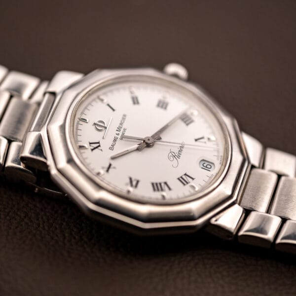 Baume & Mercier Riviera 5131.2 low-angle view emphasizing the faceted twelve-sided bezel and integrated bracelet