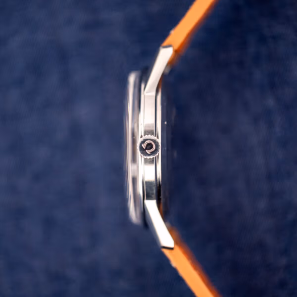 Omega 14772 stainless steel case side profile with the Omega-signed crown stamped with the Omega symbol