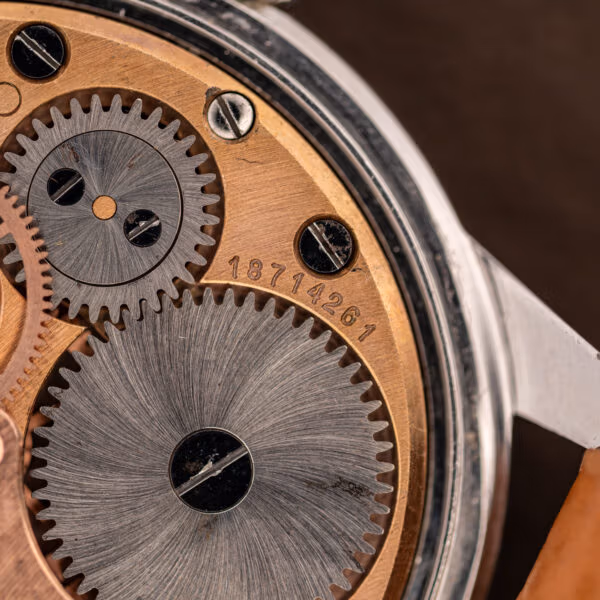 Omega caliber 285 going train with movement serial number 18714261 stamped on the gilt bridge